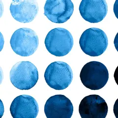 Cerchio acquerellato con diverse tonalità di blu, dal celeste chiaro al blu profondo, disposti in una griglia.