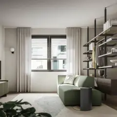 Divano angolare e mobile TV in un rilassante verde salvia colore, con scaffalatura a vista e un'elegante porta.
